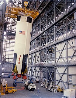 The first stage of Apollo 8 Saturn V being erected in the VAB on February 1, 1968