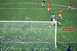 Mario Kempes scoring the first goal of the match