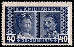 The bluish-tinted stamp shows Sophia, duchess of Hohenberg on the left, and Franz Ferdinand on the right. The stamp is titled "Militärpost" ("Military Mail") at the top, and the date of the couple's deaths at the bottom.