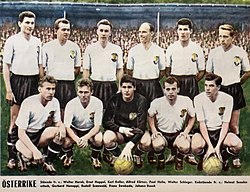 Austria national football team in 1958 with the following players – from left to right, standing; Walter Horak, Ernst Happel, Karl Koller, Alfred Körner, Paul Halla, Walter Schleger; crouched: Helmut Senekowitsch, Gerhard Hanappi, Rudolf Szanwald, Franz Swoboda and Johann Buzek.
