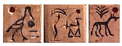 Designs on tokens from Abydos, carbon dated to c. 3400–3200 BC.[20][21] They are similar to contemporary tags from Uruk.[22]