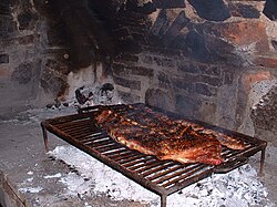 A traditional asado (barbecue)