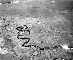 The Laramie River meanders across its floodplain in Albany County, Wyoming, 1949