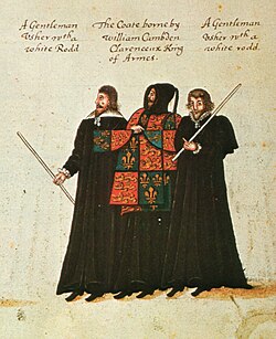 William Camden as Clarenceux King of Arms in the funeral procession of Elizabeth I in 1603. Camden is holding a "coate" possibly a royal tabard or surcoat bearing the Royal Arms of England.