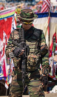 A Malaysian Army soldier armed with Colt M4 standing guard in Sabah east coast as part of the Eastern Sabah Security Command (ESSCOM)