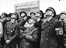 Goebbels (centre) and Armaments Minister Albert Speer (to Goebbels' left) observe rocket tests at Peenemünde, August 1943