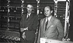 J. Robert Oppenheimer (left) and John von Neumann in front of the IAS machine (1952)