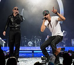 Pitbull performing with Enrique Iglesias at the Frank Erwin Center in Austin, Texas, 2015
