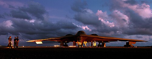 A maintenance crew servicing a B-2 at Andersen Air Force Base, Guam, 2004