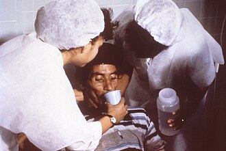 Cholera patient being treated by oral rehydration therapy in 1992