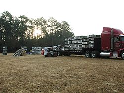 Beehives being transported for pollination on farms.