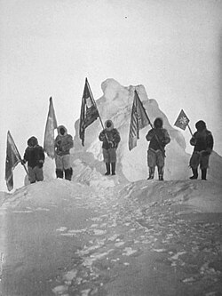 Peary's sledge party at what they claimed was the North Pole, 1909. From left: Ooqueah, Ootah, Henson, Egingwah, and Seeglo.[8]