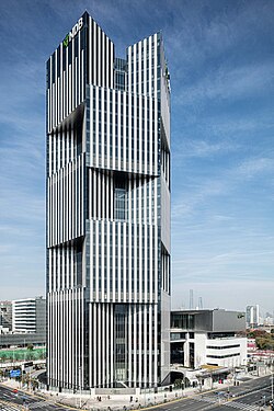 The New Development Bank, headquartered in Shanghai, China, is the premier institution of BRICS.[28]
