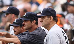 New York Yankees' manager Joe Torre (far right) in July 2007 with coaches (from left to right) Kevin Long, Ron Guidry, and Don Mattingly