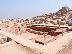 Mohenjo-daro, a city of the Indus Valley Civilization in Pakistan, which was rebuilt six or more times, using bricks of standard size, and adhering to the same grid layout—also in the third millennium BC