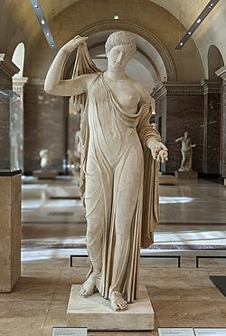 The Aphrodite of Fréjus statue on display. Aphrodite holds the apple of Discord in her left hand
