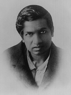 Srinivasa Ramanujan, a mathematician who is widely regarded as a genius. He made substantial contributions to mathematics despite little formal training.[9]