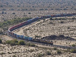 Double-stack Union Pacific container train crossing the desert at Shawmut, Arizona