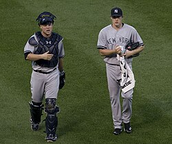Brian McCann and Chase Whitley before a game against the Orioles on July 13.