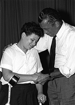 Sullivan congratulates 13-year-old Itzhak Perlman after a concert in Tel Aviv, 1958.