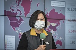 The CDC and WHO advise that masks (such as worn here by Taiwanese president Tsai Ing-wen) reduce the spread of SARS-CoV-2.