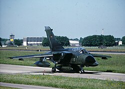 The former military airfield in 2000 with the hangar visible in the background being today's passenger terminal.