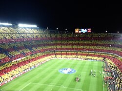 Barcelona fans creating a mosaic of the Catalan flag before a 2012 El Clásico at Camp Nou