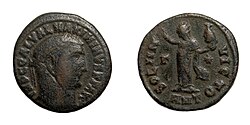 A Roman coin of Maximinus Daza. On the reverse is the Roman god Sol, holding the head of the Hellenistic god Serapis in his left hand.
