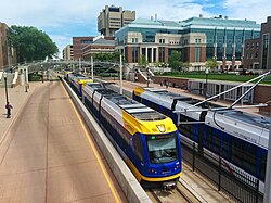 Two Metro Green Line trains on the University of Minnesota–Twin Cities campus