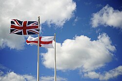 The flag of England flying alongside the flag of the United Kingdom in Southsea, Portsmouth, in July 2008