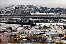 January snowfall in the eastern San Bernardino Valley, Shandin Hills are visible in the background.