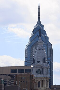 Two of Center City Philadelphia's most prominent high-rise buildings, One Liberty Place, built between 1985 and 1987 (in background), and Philadelphia City Hall, built between 1871 and 1901 (in foreground)