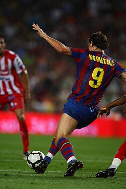 Ibrahimović playing for Barcelona in a match against Sporting Gijón in 2009