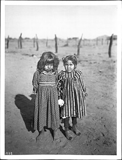 Two young Akimel Oʼodham Indian school girls, c. 1900