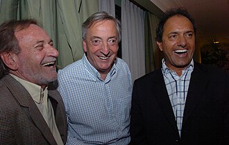 Scioli's running mate Alberto Balestrini, President Kirchner, and Scioli celebrate the victory of the Scioli-Balestrini ticket in the 2007 race for the Governor of the Province of Buenos Aires, the nation's largest.