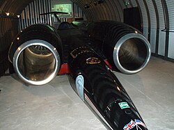 ThrustSSC, driven by Royal Air Force pilot Andy Green, holds the current land speed record at 1,227.986 km/h (763.035 mph) set October 15, 1997.