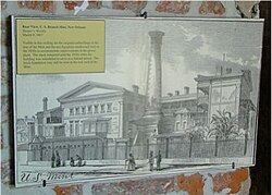 An illustration by Alfred R. Waud from Harper's Weekly in 1867 showing the smokestack built behind the New Orleans Mint. Remains of the smokestack's foundation can still be seen.