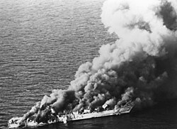 The Iranian frigate IS Sahand burns after being hit by 20 U.S. air launched missiles and bombs, killing a third of the crew, April 1988[182]