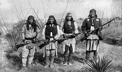 From right to left, Apache leader Geronimo, Yanozha (Geronimo's brother-in-law), Chappo (Geronimo's son by his second wife), and Fun (Yanozha's half brother) in 1886. Taken by C. S. Fly.