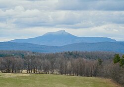 Western face of Camel's Hump Mountain (elevation 4,079 feet; 1,243 m)[66]