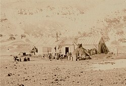 The first base on Antarctica of Carstens Borchgrevink's Southern Cross Expedition (1899). The hut (HSM 22) still stands and is located on Cape Adare, the cape where in 1895 Borchgrevnik participated in the first documented landing on Antarctica.
