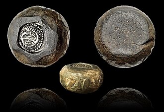 Anglo-Saxon-Viking coin weight. Material is lead and weighs approx 36 g. Embedded with a sceat dating to 720–750 AD and minted in Kent. It is edged with a dotted triangle pattern. Origin is the northern Danelaw region, and it dates from the late 8th to 9th century.