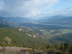 Looking south at Lake Windermere (foreground) and Columbia Lake (background) in the Columbia Valley. The mountains on the left are the Rocky Mountains and on the right are the Purcells