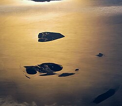 The part of the North Sea in this aerial picture is called the Hamburg Wadden Sea National Park and belongs administratively to the borough of Hamburg-Mitte. Some 50 people live here on the island Neuwerk (visible just above the centre).