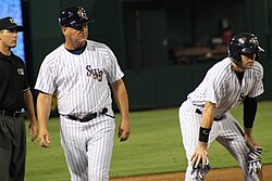 Al Pedrique (left), manager of the Scranton/Wilkes-Barre RailRiders, serving as a third base coach during a game in 2016.