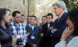 Palestinian students and John Kerry