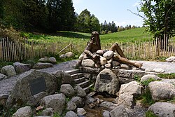 The hydrogeographical source of the Danube at St. Martin's Chapel in Furtwangen im Schwarzwald Germany: the Bregquelle, the source of the Danube's longest headstream, the Breg, where the Danube is symbolized by the Roman allegory for the river, Danuvius.