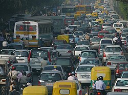 Traffic in Delhi, India. Car sharing can help reduce traffic congestion and improve air quality.