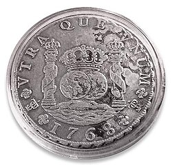 A piece of eight from the Potosí mint, showing the Pillars of Hercules with 'S' ribbons, and two "PTSI" monograms at about 4 and 8 o'clock around the edge