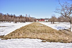 Mound covering one of the mass graves of Butovo firing range